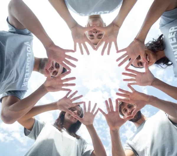 depositphotos_76632667-stock-photo-happy-volunteers-playing-with-their